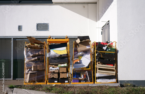 Cardbox collected for recycling in the back of a shopping mull
