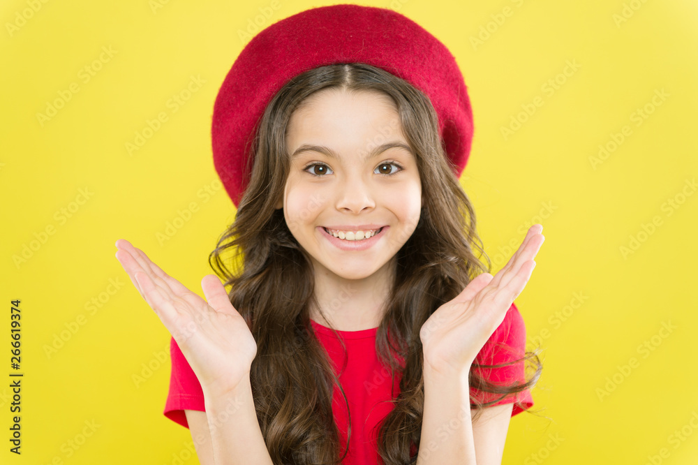 Styling of curly hair. Hairdresser service. Kid girl long healthy shiny hair. Perfect curls. Kid cute face with adorable curly hairstyle wear beret hat. Little fashionista. Little girl grow long hair Styling of curly hair. Hairdresser service. Kid girl long healthy shiny hair. Perfect curls. Kid cute face with adorable curly hairstyle wear beret hat. Little fashionista. Little girl grow long hair