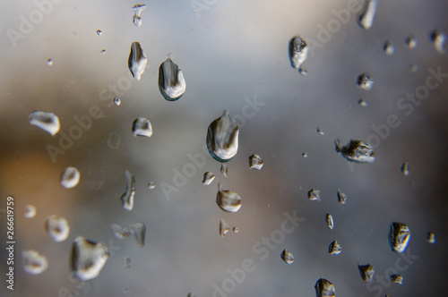 Macro close up of rain drops on the window glass