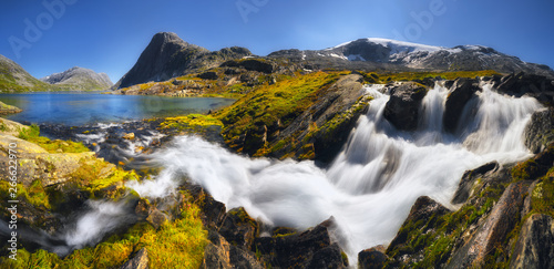 Waterfall in the south of Norway near Geiranger on a sunny day, Romsdal © yauheni_m