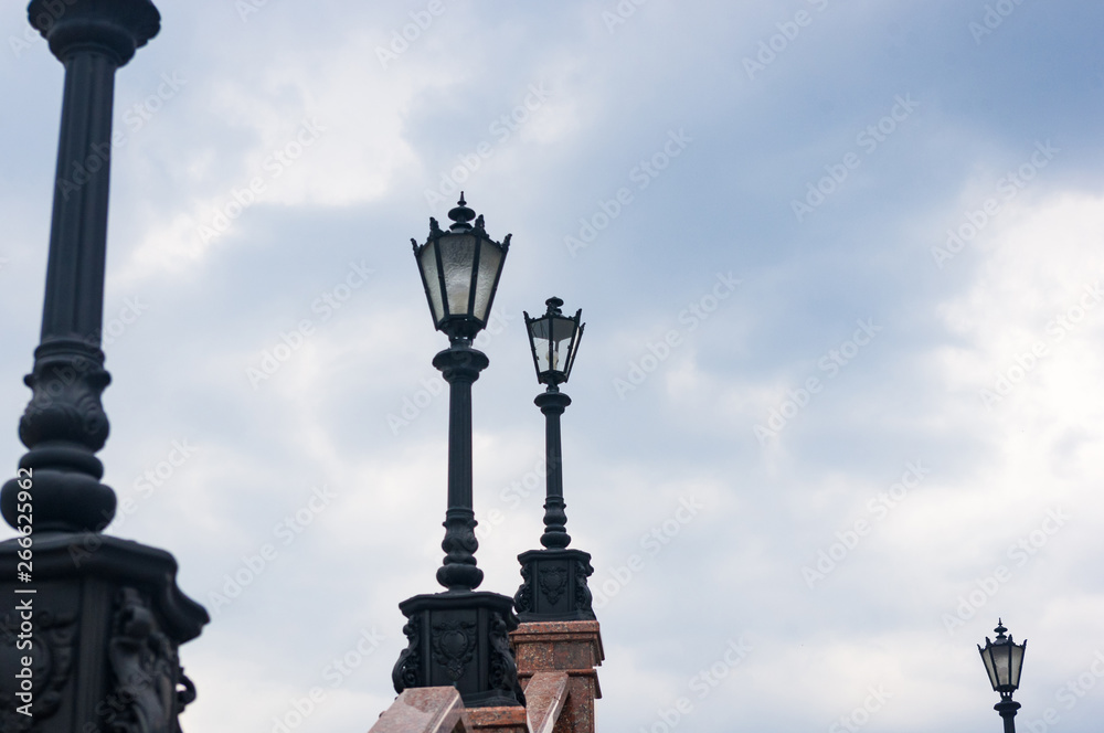 Classic style city lamppost at sunset, close up