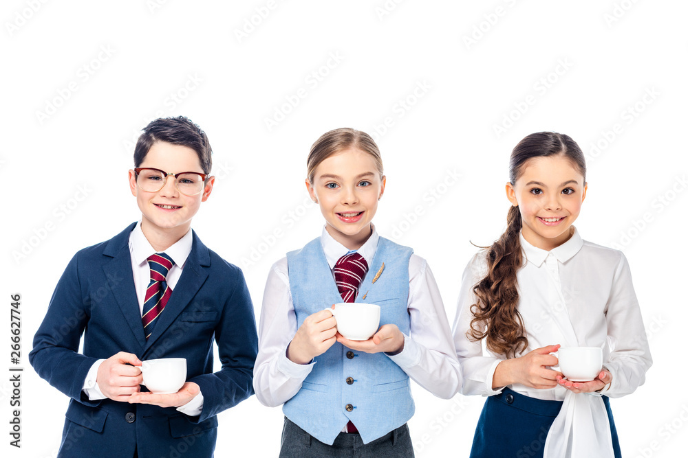 happy schoolchildren pretending to be businesspeople with coffee cups Isolated On White happy schoolchildren pretending to be businesspeople with coffee cups Isolated On White