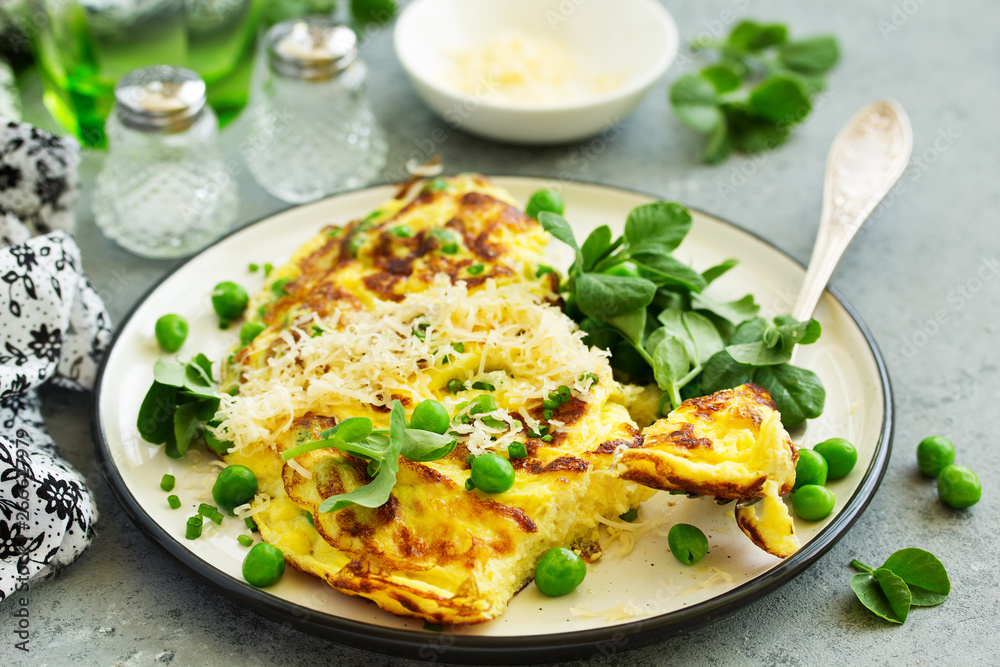 Breakfast. Frittata Italian omelet with green peas and salad. Breakfast. Frittata Italian omelet with green peas and salad.