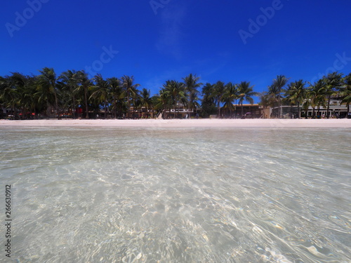 Clear Blue Sea & White Beach - Boracay Island, Philippines photo