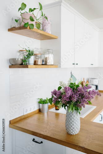 Modern white kitchen in scandinavian style.