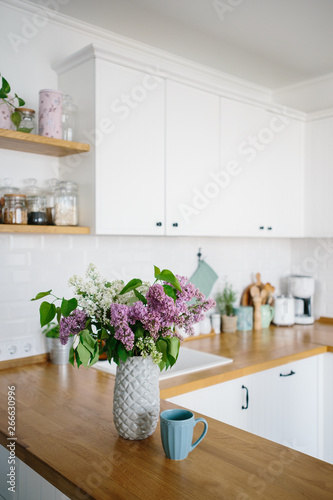 Modern white kitchen in scandinavian style.