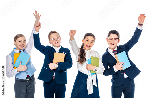 happy schoolchildren with outstretched hands holding books Isolated On White