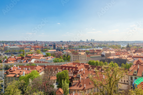 Photography Outdoor sunny aerial top panoramic view of Prague historical old town skyline and  famous landmark Charles Bridge cross Vltava river from observation deck near Prague Castle in Prague, Czech Republic