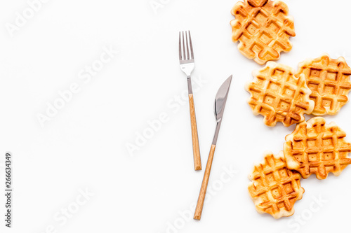 Traditional belgian waffles on served wooden table background top view mockup