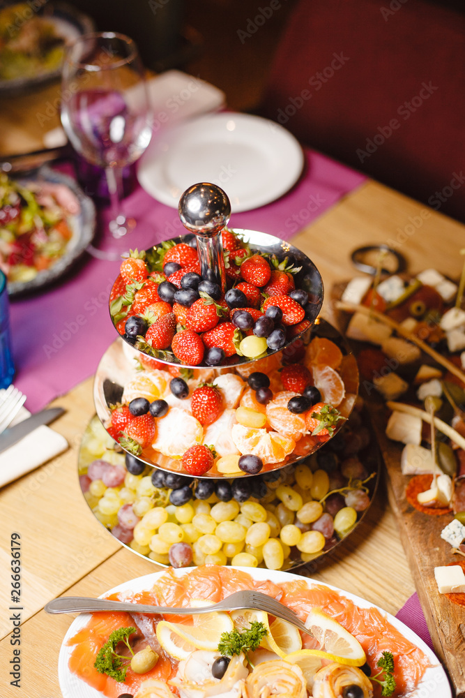 Berries and fruit centerpiece on a banquet table