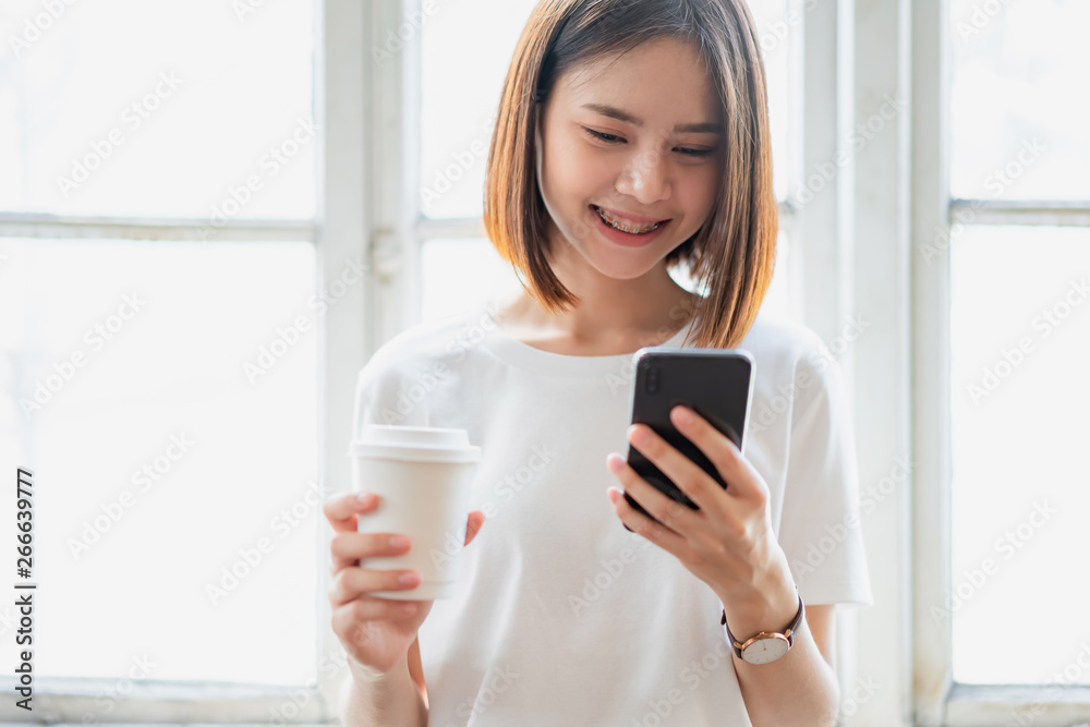 Woman using smartphone, During leisure time. The concept of using the phone is essential in everyday life. Woman using smartphone, During leisure time. The concept of using the phone is essential in everyday life.