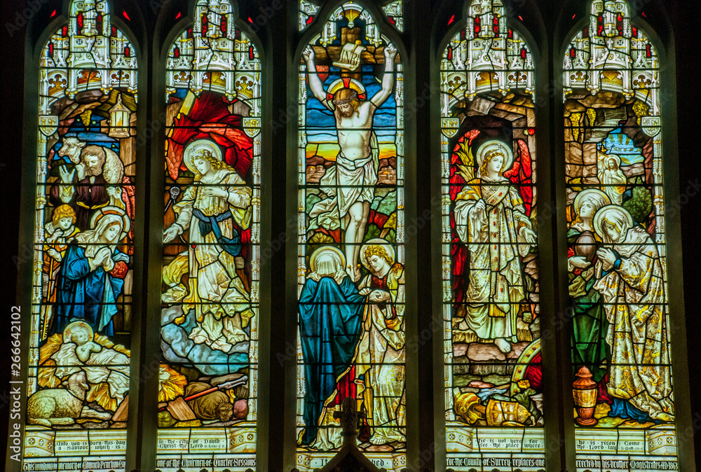 Stained glass window illustrated Bible stories in the Christ Church.