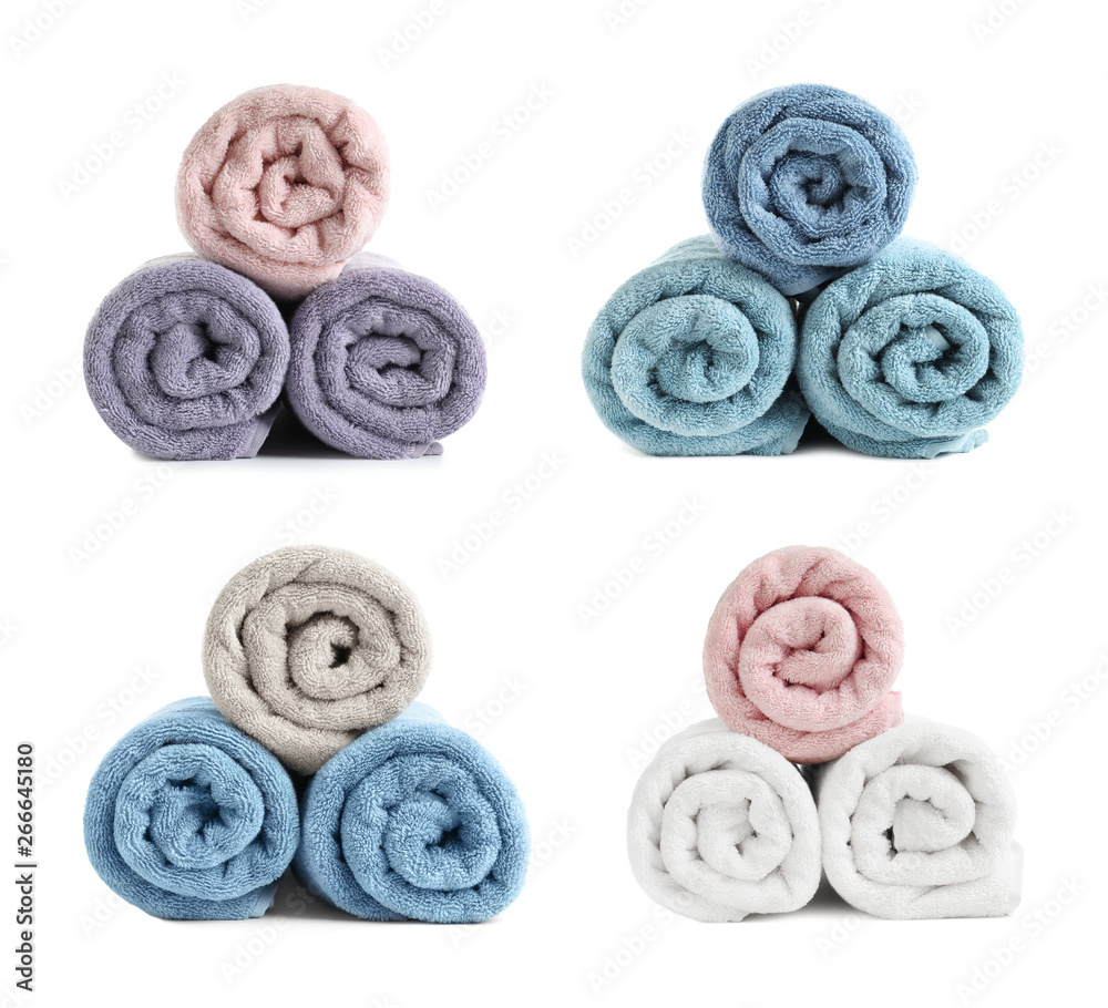 Set of rolled soft terry towels on white background Set of rolled soft terry towels on white background