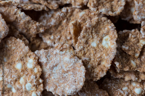 Multigrain natural flakes as background. Healthy food. Top view.
