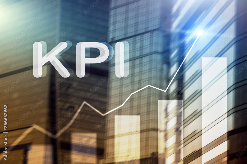 KPI - Key Performance Indicator. Business and technology concept. Multiple exposure, mixed media. Financial concept on blurred background. KPI - Key Performance Indicator. Business and technology concept. Multiple exposure, mixed media. Financial concept on blurred background.