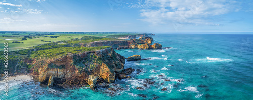 Aerial panorama of eroding rocks on ocean coastline near Warrnambool, Australia photo