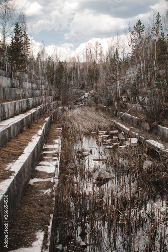 Abandoned marble quarry in Siberia. Extraction of minerals