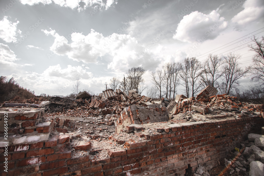 The ruins of a brick house. The house is destroyed, a natural disaster.