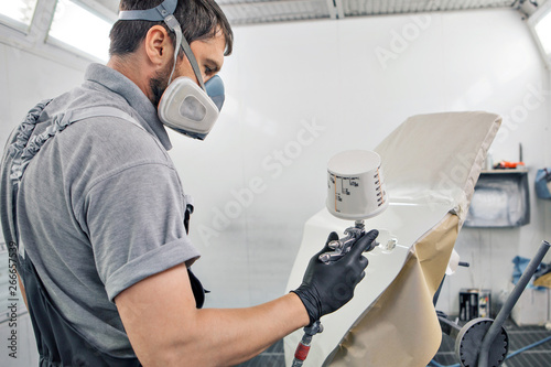 Detail of the machine close-up. paint is applied to the surface of the machine