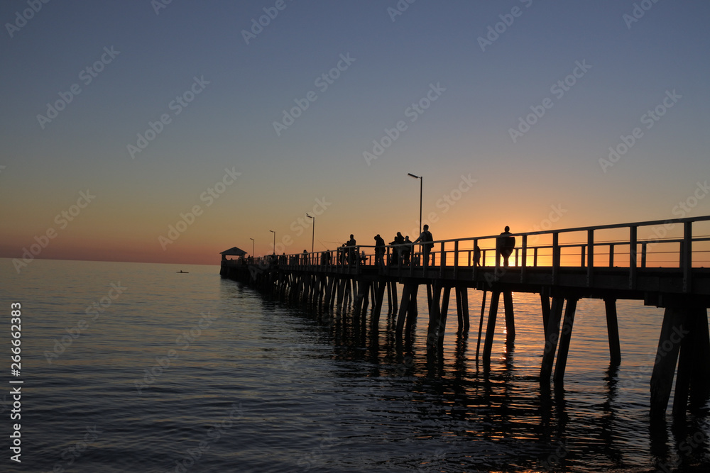 Silhouette of Henley Beach pier at dusk in Adelaide South Australia