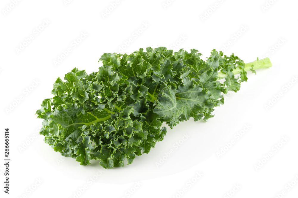 Fototapeta premium Fresh organic green kale leaves isolated over white background
