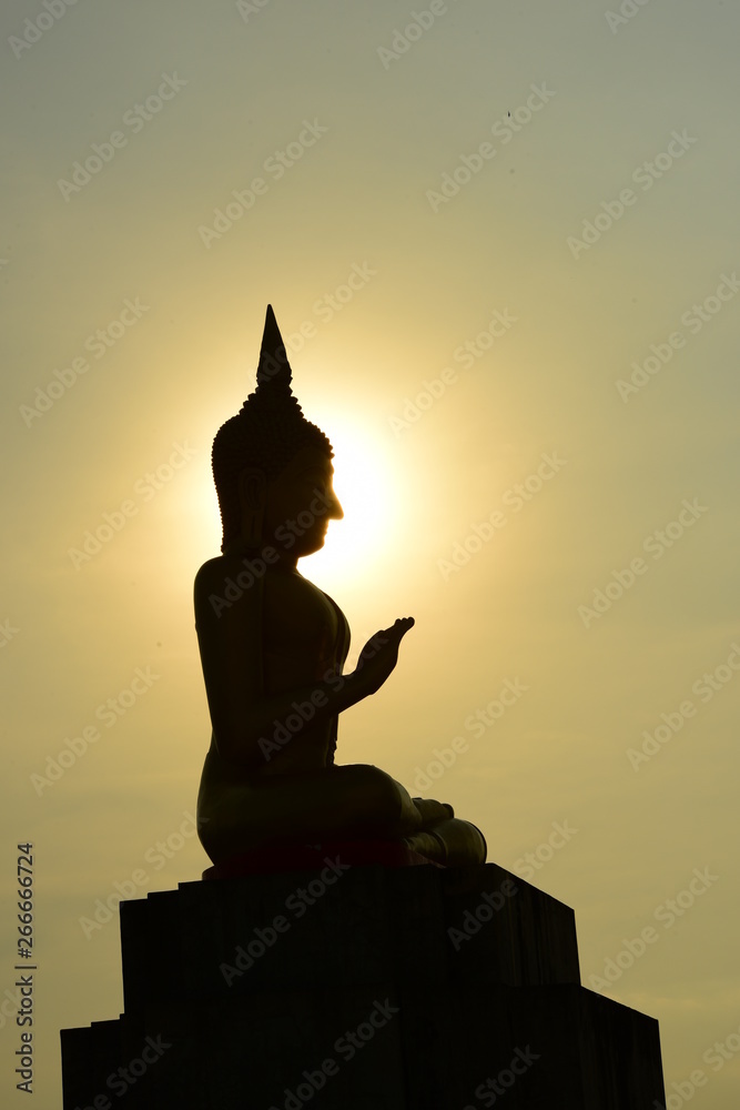 Obraz premium temple and buddha statue,Buddhist shadow with wisdom enlighten light spread.