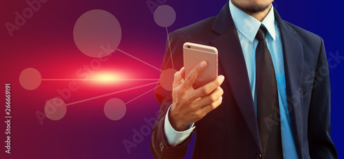 Man holding mobile smart phone technology background