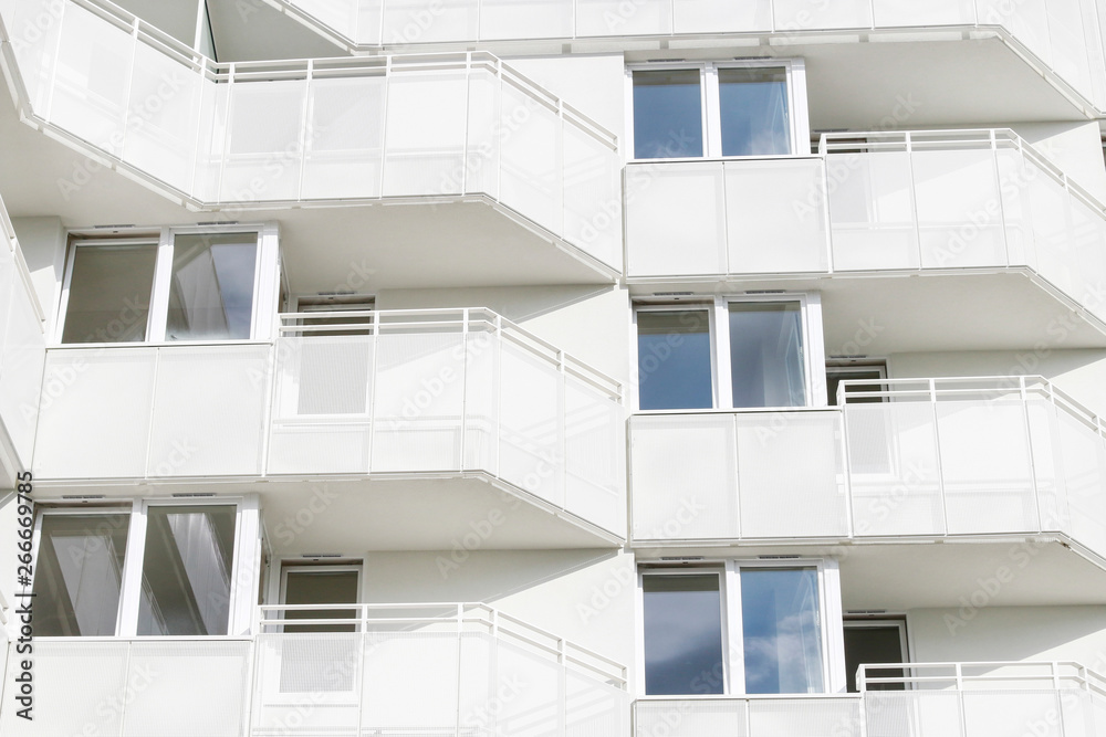 White apartment building White apartment building