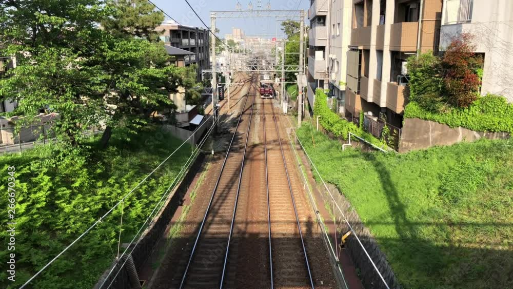 Express train passing through Shukugawa, Japan.