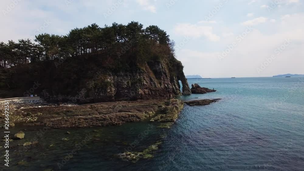 Sacheon City, Elephant Rock, Drone Shot flying low over the sea Sacheon City, Elephant Rock, Drone Shot flying low over the sea