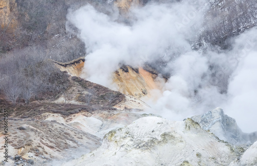 Landscape of mountain in the hot spring area with some steam look like smoke