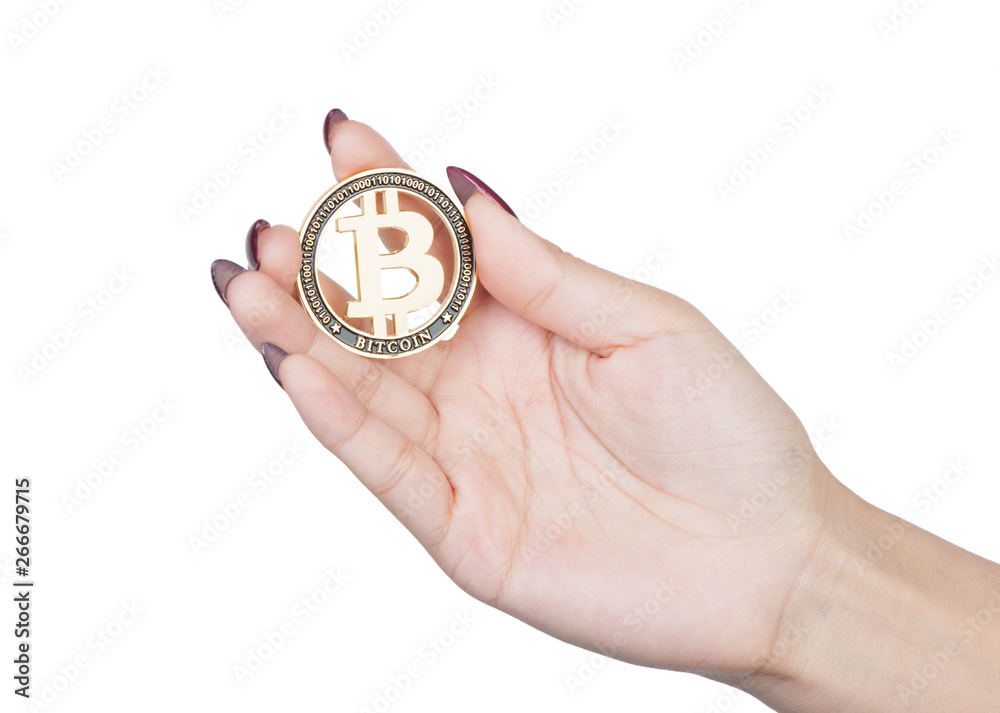 Female hand hold gold Bitcoin Female hand hold gold Bitcoin