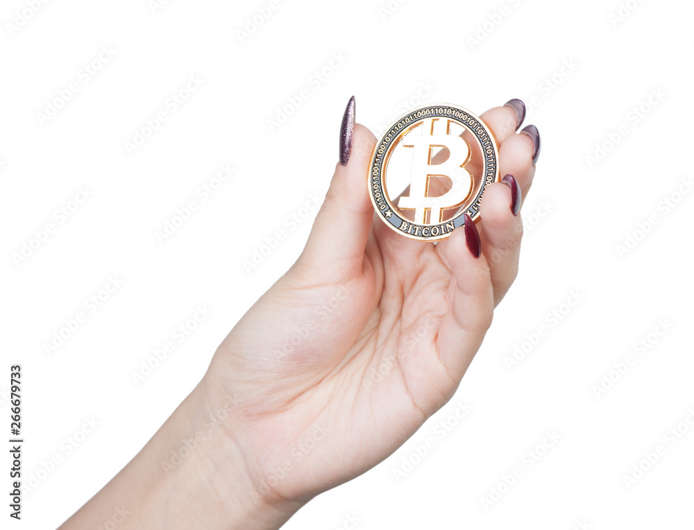 Female hand hold gold Bitcoin Female hand hold gold Bitcoin