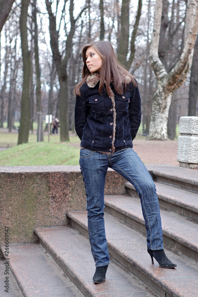 Obraz premium Young attractive asian woman in jacket