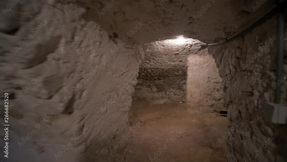 Moving Shot In An Old Empty Stone Wine Cellar in an old cold french house. Moving Shot In An Old Empty Stone Wine Cellar in an old cold french house.