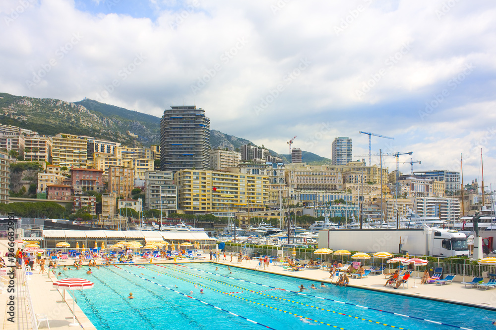 Cityscape with swimming pool in a district La Condamine of Principality Monaco