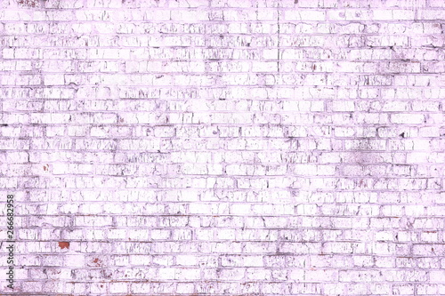 Unusual bright saturated abstract purple background from old brick wall in retro style