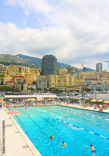 Cityscape with swimming pool in a district La Condamine of Principality Monaco