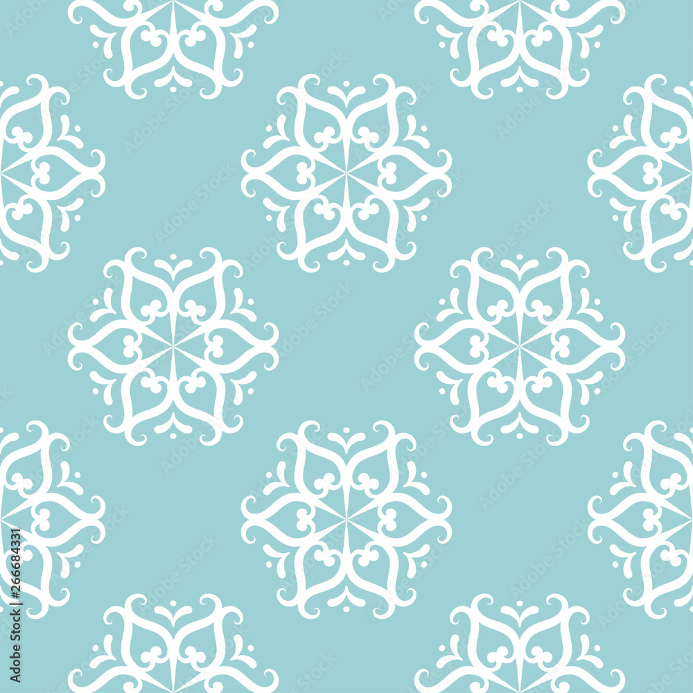 Floral seamless pattern. White on blue. Textile background