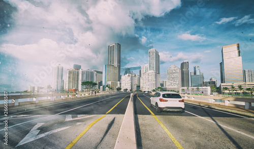 Entering Miami on the road with a beautiful city skyline, Florida, USA © jovannig