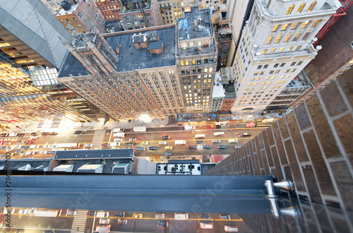Canvas Print Amazing skyscrapers in Midtown Manhattan, aerial view from rooftop with traffic