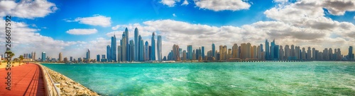 DUBAI, UAE - DECEMBER 10, 2016: .View of Marina buildings from Palm Jumeirah. Dubai attracts 15 million tourists annually