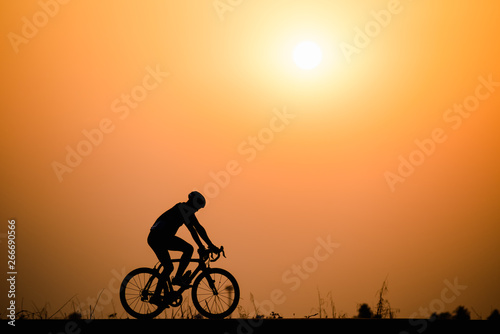 Wallpaper Mural Silhouette man cycling on sunset background Torontodigital.ca
