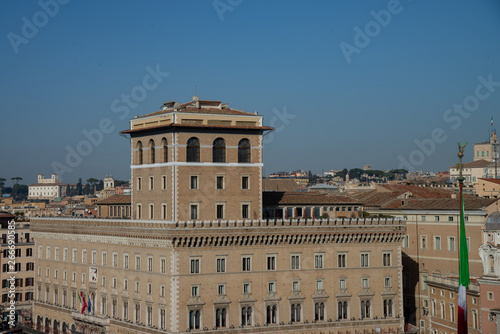 Palazzo delle Assicurazioni Generali Rome, Italy. The eastern side of Piazza Venezia is now closed by the Palazzo delle Assicurazioni Generali, completed in 1907. photo