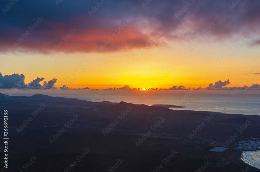 Landscape of Lanzarote coastline at sunset