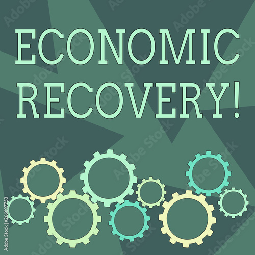 Conceptual hand writing showing Economic Recovery. Concept meaning rise of business activity signaling the end of a recession Cog Wheel Gear Engaging  Interlocking and Tesselating