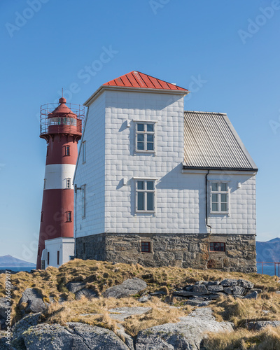 Grasoyane Lighthouse with blue skye at Ulsteinvik, Norway 15 april 2019 photo