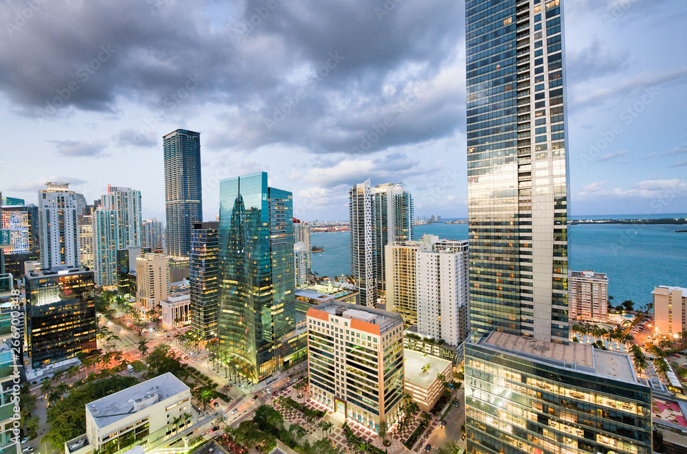 Obraz premium Amazing night skyline of Downtown MIami. Wide angle view of city skyscrapers on a cloudy morning