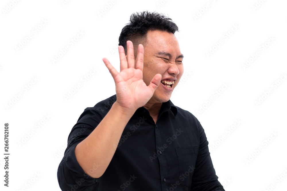 Portrait of an Asian man showing No sign or rejected something over white background. Portrait of an Asian man showing No sign or rejected something over white background.