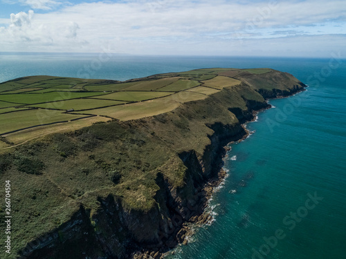 British coastline with cliffs and farmland photo